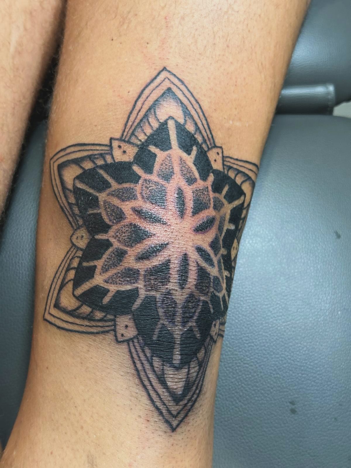 Voorbeeld van een tattoo in de stijl van Oottat Tattoo